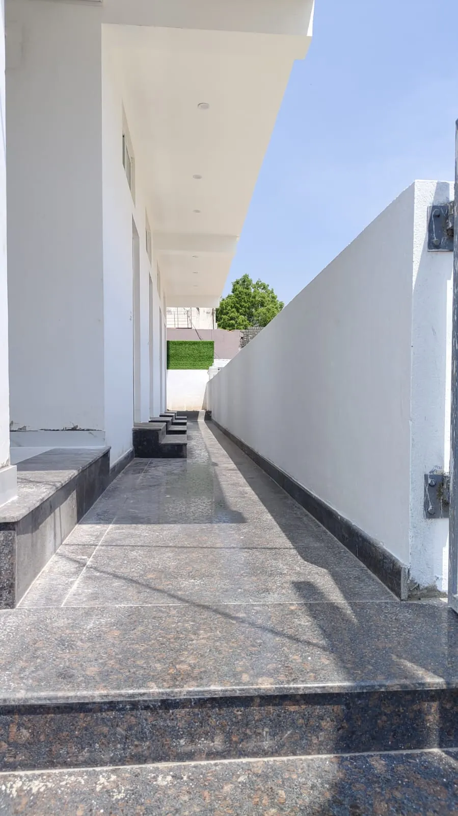 Granite walkway along the rooms